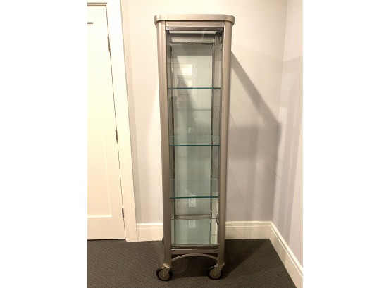 1 Of 2 Industrial Style Brushed Chrome Glass Cabinet On Casters   (LOC: W1)