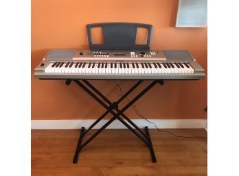 A Yamaha YPG-235 Piano-focused 76-key Portable Grand, Stand And Survival Kit
