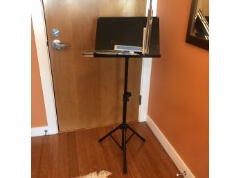 A Heavy Duty Music Stand And A Pair Of Folding Lightweight Stands