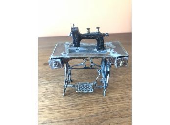A Miniature Lead Sewing Machine - Antique