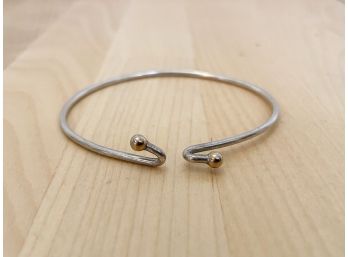 Tiffany & Co. Sterling Silver And 18K Yellow Gold Twist Hook Bangle Bracelet