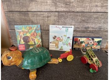 Vintage Toy Lot Including Timmy Turtle, Tractor, Jolly Jumper, Potato Head Pencil Case And Books With Record