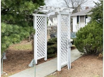 A Custom Made Painted Wood Arbor With Lattice Side Panels