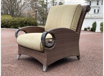A Large Metal And Resin Arm Chair By Cast Classics