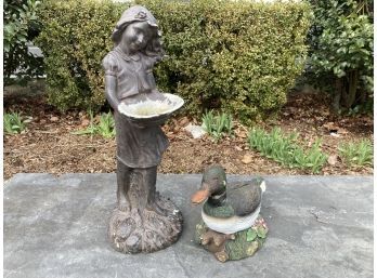 A Cast Acrylic Birdbath And Duck