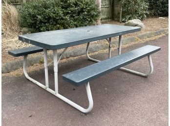 A Commercial Resin And Metal Picnic Table