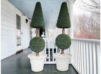A Pair Of Large Faux Boxwood Topiaries In Cast Stone Planters