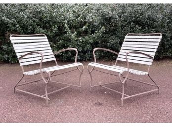 A Pair Of Vintage Cast Aluminum And Acrylic Strapped Patio Chairs By Molla Furniture