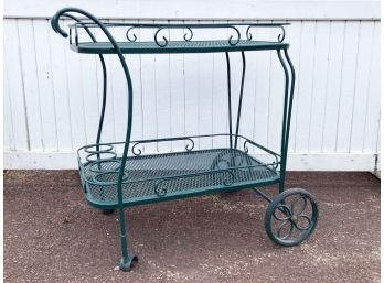 A Vintage Wrought Iron And Mesh Bar Cart