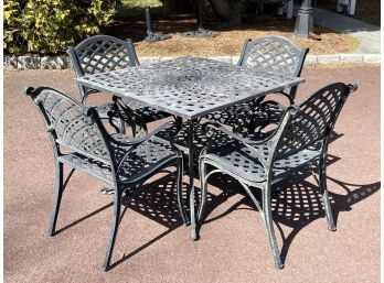 A Cast Aluminum Dining Table And Set Of 4 Chairs, Possibly Woodard