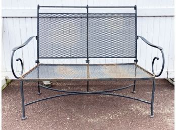 A Vintage Wrought Iron And Mesh Settee