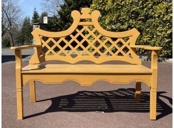 A Painted Pine Slatted Bench With Latticework Back