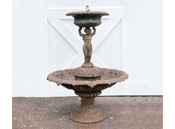 An Antique Cast Iron Two Tiered Garden Fountain