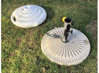 A Pair Of Vintage Umbrella Bases - Cast Iron And Fillable Acrylic