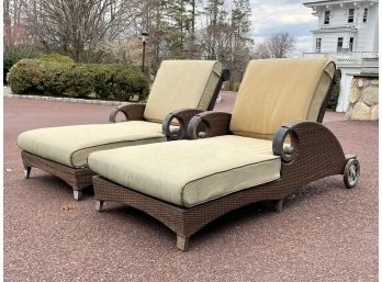 A Pair Of Metal And Resin Patio Loungers By Cast Classics