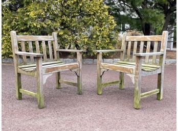 A Pair Of Weathered Teak Arm Chairs By Smith & Hawken