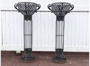 A Pair Of Antique Cast Metal Plant Pedestals With Lattice Urn Form Tops