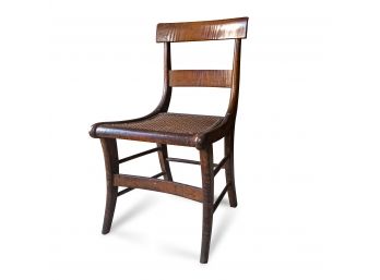 An Antique Caned Mahogany Chair