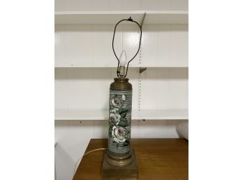 A Vintage Ceramic Lamp On Brass Base