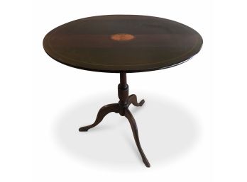 An Antique Mahogany Inlaid Banded Oval Tripod Table