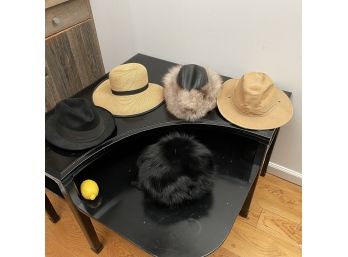 Women's Hat Collection And A Fur Muff