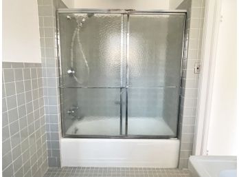 A Vintage Shower Enclosure And Tub