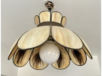 A Glass And Metal Hanging Light With Real Ostrich Feathers