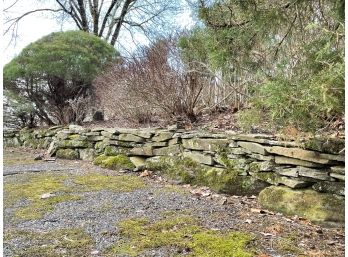 An Aged Stone Wall With Beautiful Patina - Approx 65' Long