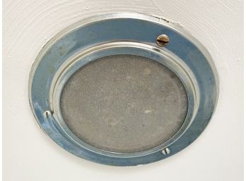 A Pair Of Metal Disc Recessed Lights