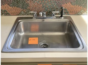 A 25x22 Stainless Steel Surface Mounted Sink