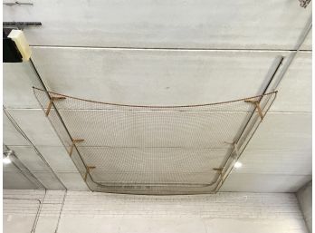 A Ceiling Mounted Cargo Storage Net