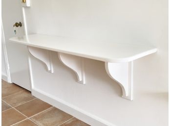 A Wood Shelf With Supports