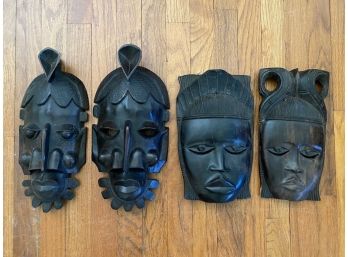 Four Contemporary Carved African Ebony Wood Masks