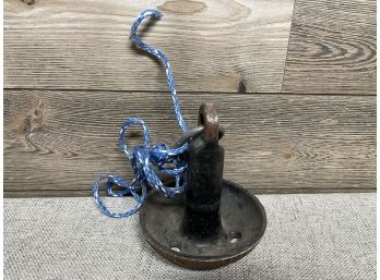 A Boat Anchor With Rope