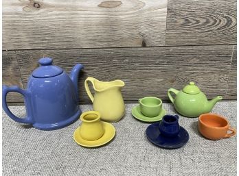 A Collection Of Schylling Ware In Vibrant Colors