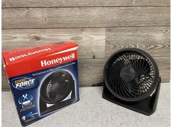 A Honeywell Black Desk Fan