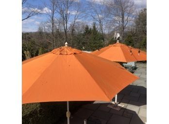 A Pair Of Orange Cloth Sunbrella Pool Umbrellas - Crank -tilt- 1/2