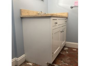 A Stone Top Vanity With Undermount Kohler Sink And Chrome Plate Hardware, Basement