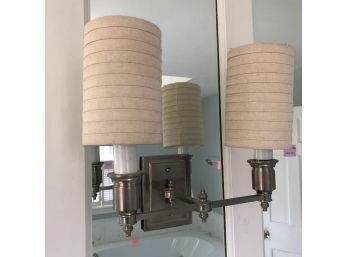 A Traditional Double Sconce With Brushed Nickel Finish