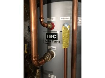An  IBC SL35-199 Propane Boiler And BTI Series Water Heater - Only 2 Yrs Old!