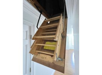A Folding Pull Down Attic Stair Case