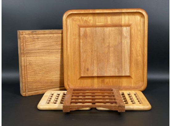 An Assortment Of Wood Kitchen Items: Trivets & Boards