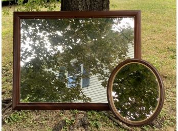 A Pair Of Vintage Wood Framed Mirrors
