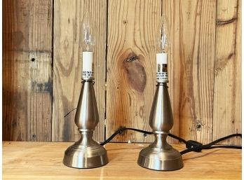 A Pair Of Chrome Lamps