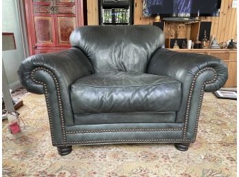 A Rolled Arm Natuzzi Leather Arm Chair