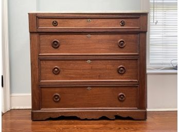 A Victorian Mahogany Chest Of Drawers With Marble Top
