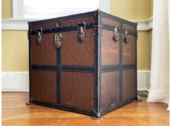 An Antique Leather And Metal Travel Trunk