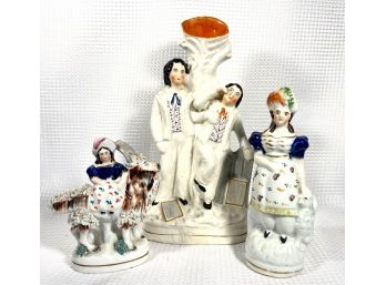 Lot Three Antique Staffordshire Figures And Spill Vase