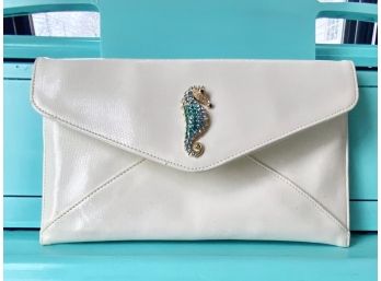 Off White Clutch With A Turquoise Seahorse Clasp
