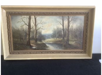 Signed Oil Painting Of A River Through A Forest